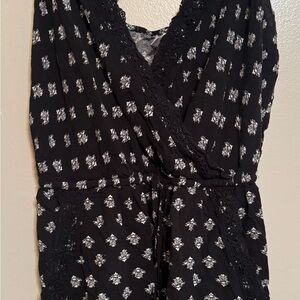 Chic Black Romper with White Patterns